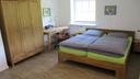 Ferienwohnung 3 - Schlafzimmer mit Doppelbett