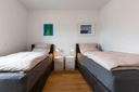 zweites Schlafzimmer mit Einzelbetten im Ferienhaus