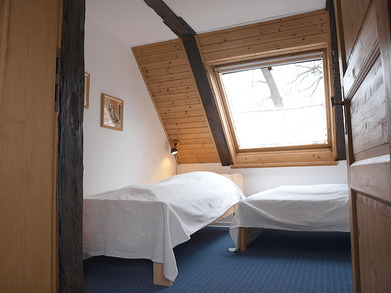 Schlafzimmer Ferienwohnung Alte Bauernkate  "Heuboden"