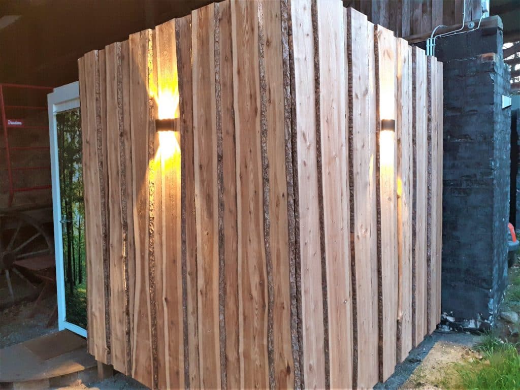 Neuland-Hof Spöring Wohnfass Sanitärhaus