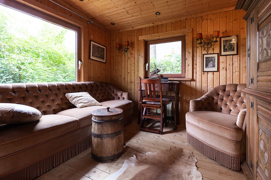 Wohnzimmer Ferienhaus Jagdhütte zum Heidebach Müden Örtze